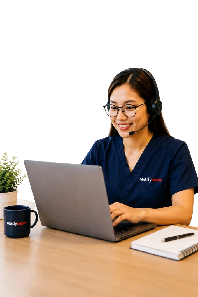 ReadyTeam virtual medical assistant in navy scrubs reviewing patient documentation on a laptop, wearing a headset